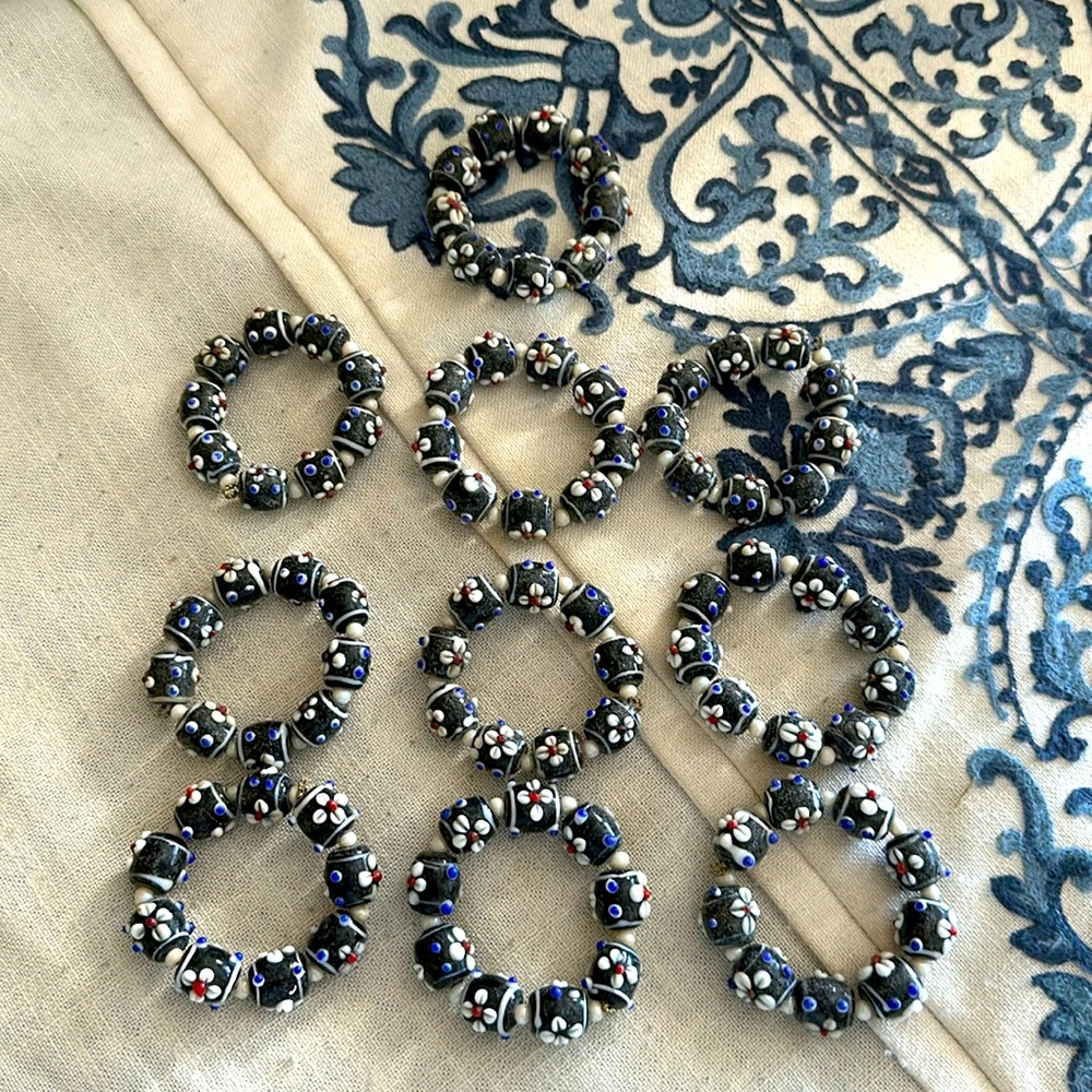 Napkins rings set of  TEN glass handmade blue and white flowers red middles